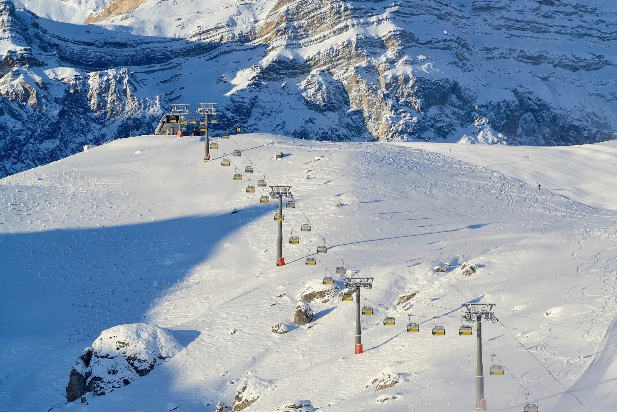 Ski lifts running up the snowy slopes of Shahdag